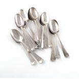 A collection of fifteen antique silver Hanoverian pattern tablespoons, various dates and makers, the