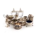 A mixed lot of silver items, comprising: a pair of George III silver mounted cut-glass mustard pots,