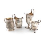 A mixed lot of silver items, comprising: a George III cream jug, London 1800, oval form, engraved