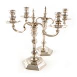 A pair of modern silver two-light candelabra, by R. Comyns, London 1973, in the George I manner,