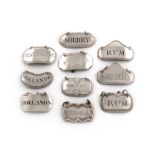 A collection of ten antique small silver wine labels, various dates and makers, including one with a