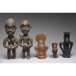 Two Cameroon figural pipe bowls pottery, 16.5cm and 9cm high, a Cameroon pottery seated figure, 16.