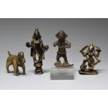 An Indian votive figure of Durga cast brass, depicted slaying the buffalo demon Mahishasura with a