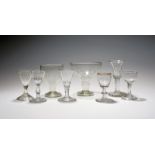 Six small liqueur glasses, 18th century and later, one on a plain stem over a folded foot, one