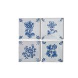 Four Lambeth delftware botanical tiles, c.1760-80, finely painted in blue, each with a single flower