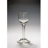 A commemorative goblet or wine glass, late 18th century, the ogee bowl engraved with a spoiled