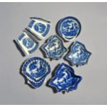 Four Caughley blue and white pickle dishes, c.1770-85, three of vine leaf shape and one scallop