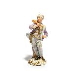 A Meissen figure of a boatman from the Cris de Paris series, mid 18th century, modelled by J J