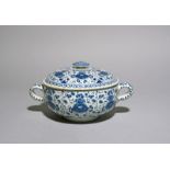 A London delftware milk tureen or broth bowl and cover, c.1690, the circular form painted in blue