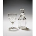 A carafe and wine glass from the Royal Yacht Osborne, c.1880, engraved with a garter around a