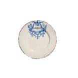 A Delft plate, dated 1692, painted in blue with the initials 'AC' above the date 1692, within a