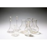 Seven glass carafes or small vases, late 18th/19th century, two of plain bottle shape, one with a