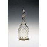 A moulded glass decanter and stopper, c.1770-80, the slender form with an allover diamond design
