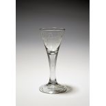A Continental privateer wine glass, c.1780, the drawn trumpet bowl engraved 'J Barton / Success to