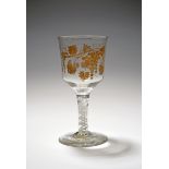 A large wine goblet, c.1760-70, the generous bowl gilded in the London atelier of James Giles with a
