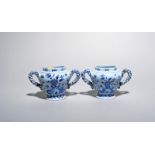 A pair of Delft or faïence small vases or jars, late 18th century, painted in blue and manganese
