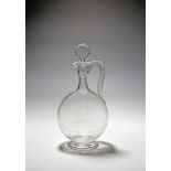 An armorial glass jug and stopper for the Copeland family, 19th century, the slightly flattened form