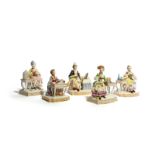 A set of Meissen figures of the Five Senses, modern, each modelled as a seated lady with varying