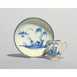 A Pennington's (Liverpool) miniature blue and white coffee cup and saucer, c.1775, painted with a