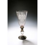 A massive Saxon engraved armorial goblet, c.1740, of ceremonial size, engraved to one side with a