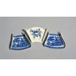 Three Worcester blue and white asparagus servers, c.1775-85, two printed with the Fisherman pattern,