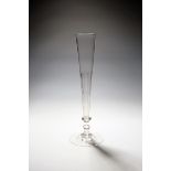 A massive ceremonial ale glass or flute, 19th century, the tall slender bowl cut with polished