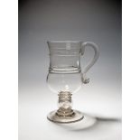 A large coin mug or tankard, 2nd half 18th century, the body applied with rings and trailing to