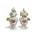 A pair of Longton Hall rococo-moulded vases and covers, c.1758-60, of asymmetrical form, painted