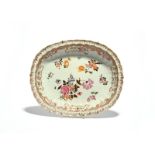 A large Chinese porcelain oval dish, 2nd half 18th century, painted in the famille rose palette with