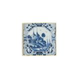 A rare Liverpool delftware tile, c.1750-75, painted in blue with swans swimming before buildings