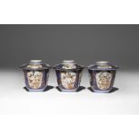 THREE JAPANESE CUPS AND COVERS EDO PERIOD, C.1690-1700 All decorated with panels enclosing elegant