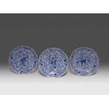 THREE JAPANESE BLUE AND WHITE DISHES EDO PERIOD, C.1700 Each with a scalloped rim and painted to the