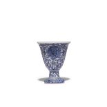 A SMALL JAPANESE BLUE AND WHITE FOOTED CUP EDO OR MEIJI PERIOD, 19TH CENTURY The inside decorated