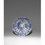 A JAPANESE ARITA BLUE AND WHITE SHALLOW BOWL EDO PERIOD, 17TH CENTURY With a barbed rim, the