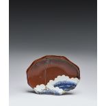 A RARE JAPANESE TENMOKU AND BLUE AND WHITE DISH EDO PERIOD, C.1660-70 The shaped dish decorated with