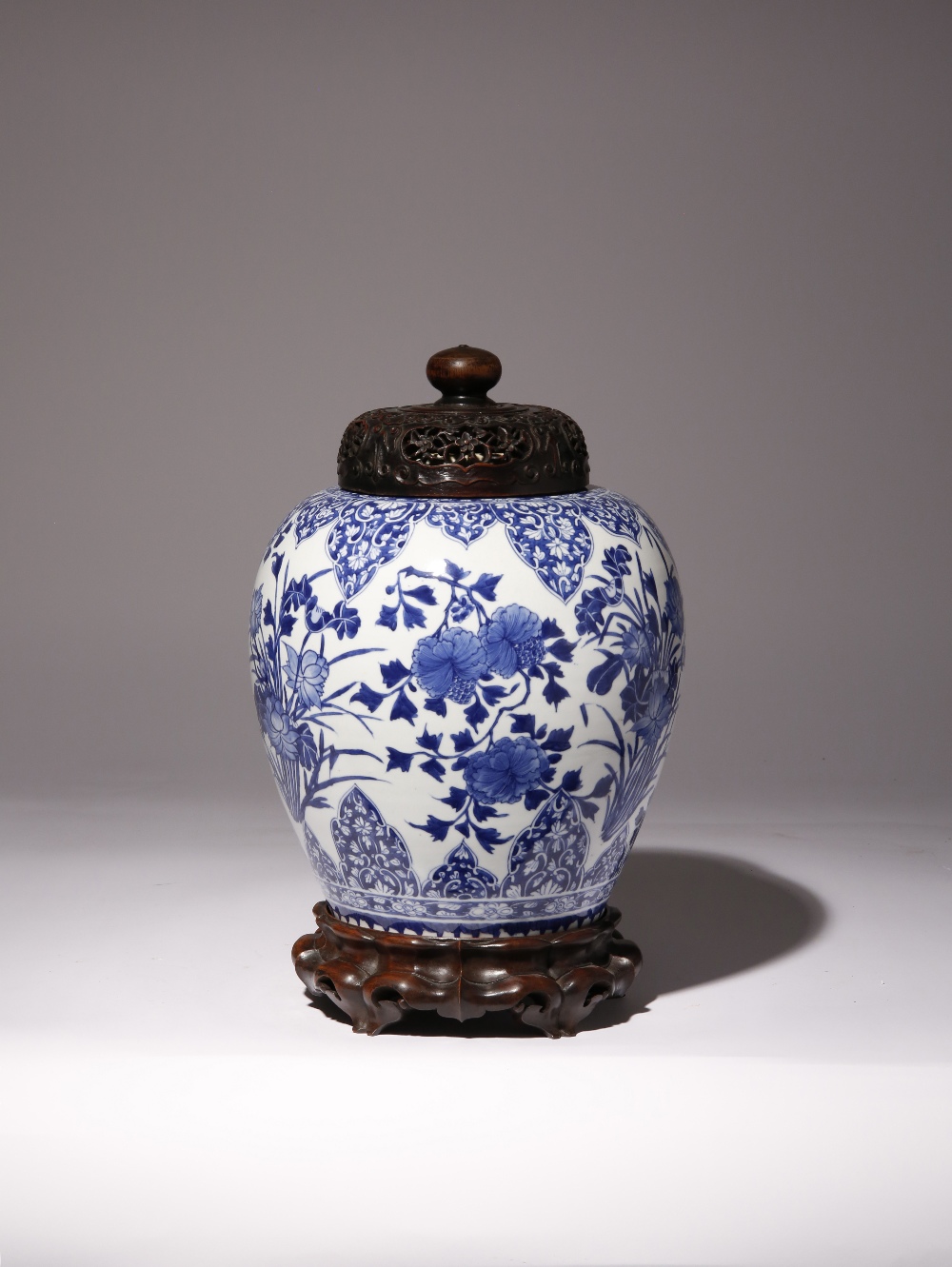 A CHINESE BLUE AND WHITE 'LOTUS' VASE KANGXI 1662-1722 Decorated with three large lotus sprays