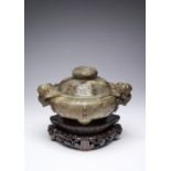 A CHINESE CELADON JADE 'MYTHICAL BEASTS' TRIPOD INCENSE BURNER AND COVER QIANLONG 1736-95 The