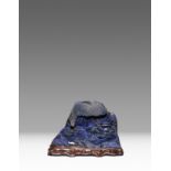 A CHINESE LAPIS LAZULI BOULDER CARVING QING DYNASTY One side carved in relief with two scholars