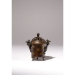 A CHINESE GOLD-SPLASHED INCENSE BURNER AND COVER QING DYNASTY The cover pierced with foliage and