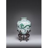 A FINE CHINESE IMPERIAL GREEN-ENAMELLED 'DRAGON' JAR AND COVER SIX CHARACTER QIANLONG MARK AND OF
