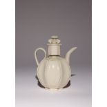 A CHINESE QINGBAI OCTAGONAL EWER AND COVER NORTHERN SONG DYNASTY The faceted body applied with a