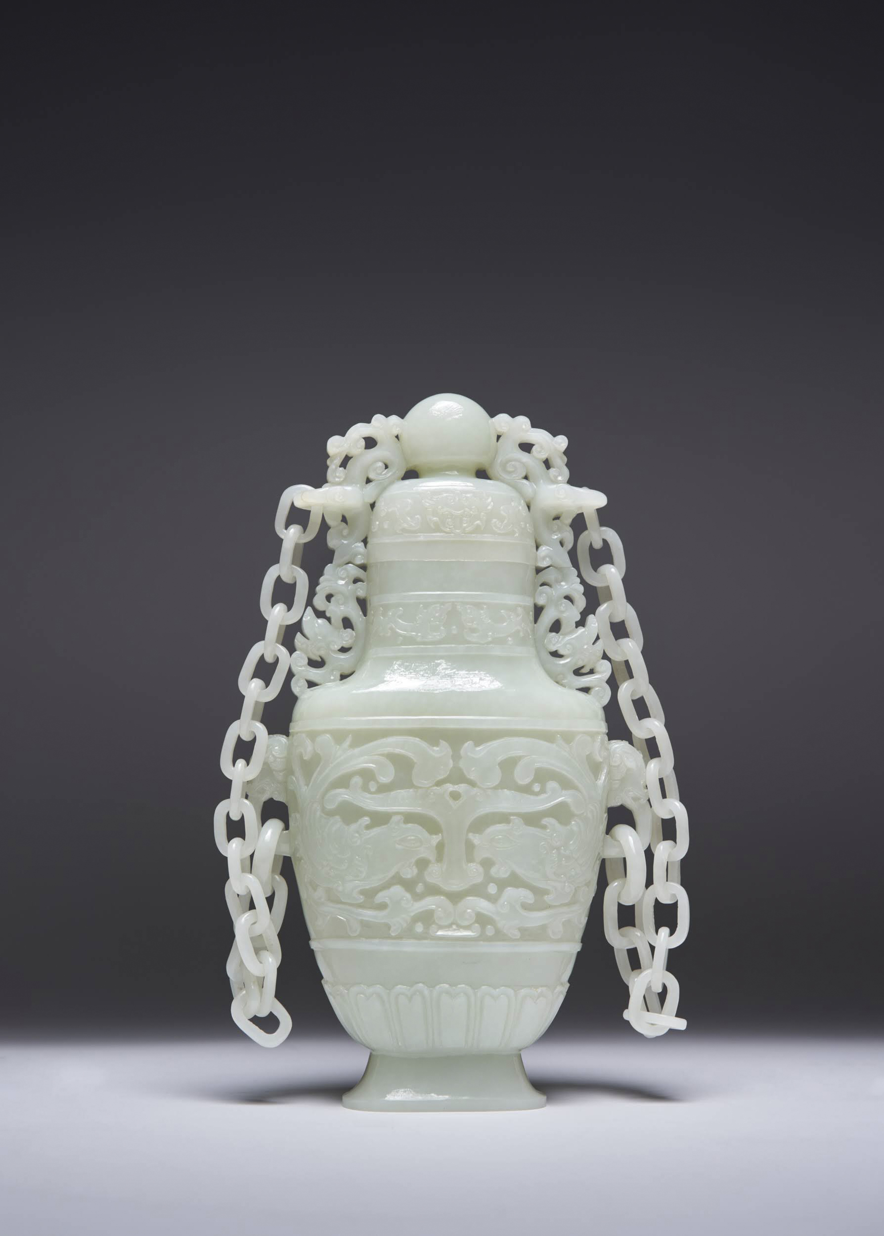 A LARGE CHINESE PALE CELADON JADE VASE AND COVER LATE QING DYNASTY/REPUBLIC PERIOD Of flattened