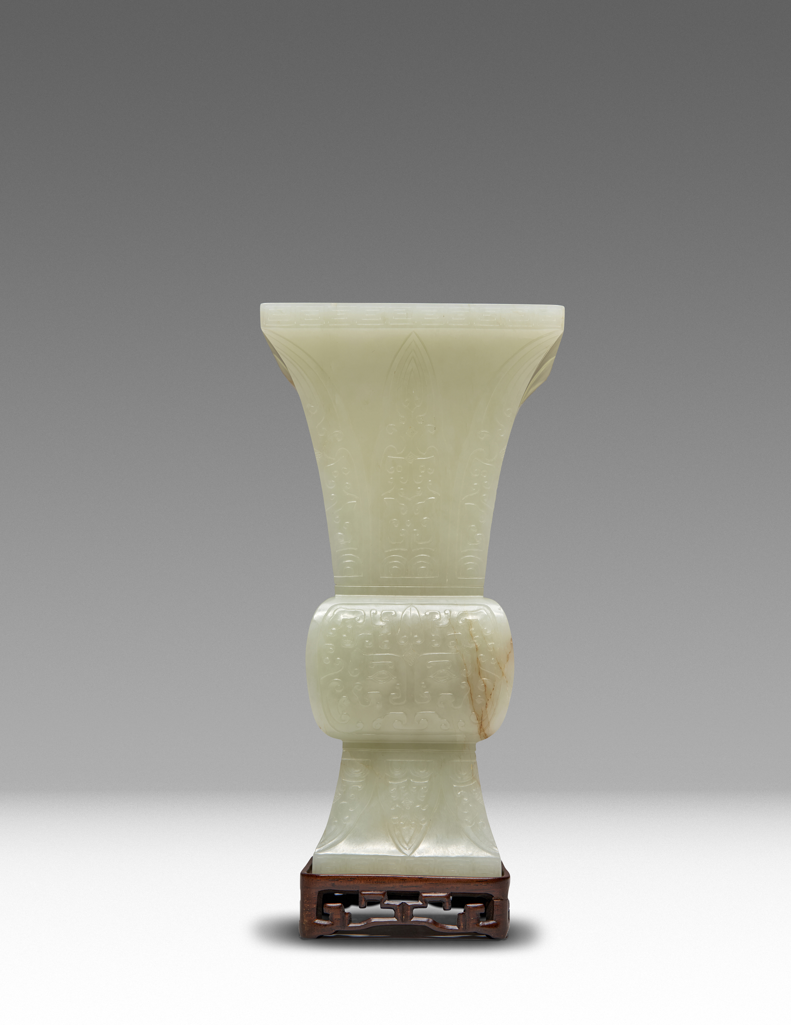 A RARE CHINESE IMPERIAL PALE CELADON JADE ARCHAISTIC VASE, FANGGU FOUR CHARACTER QIANLONG YU WAN