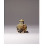 A LARGE CHINESE CARVED AGATE SNUFF BOTTLE QING DYNASTY OR LATER The bulbous body carved with figures