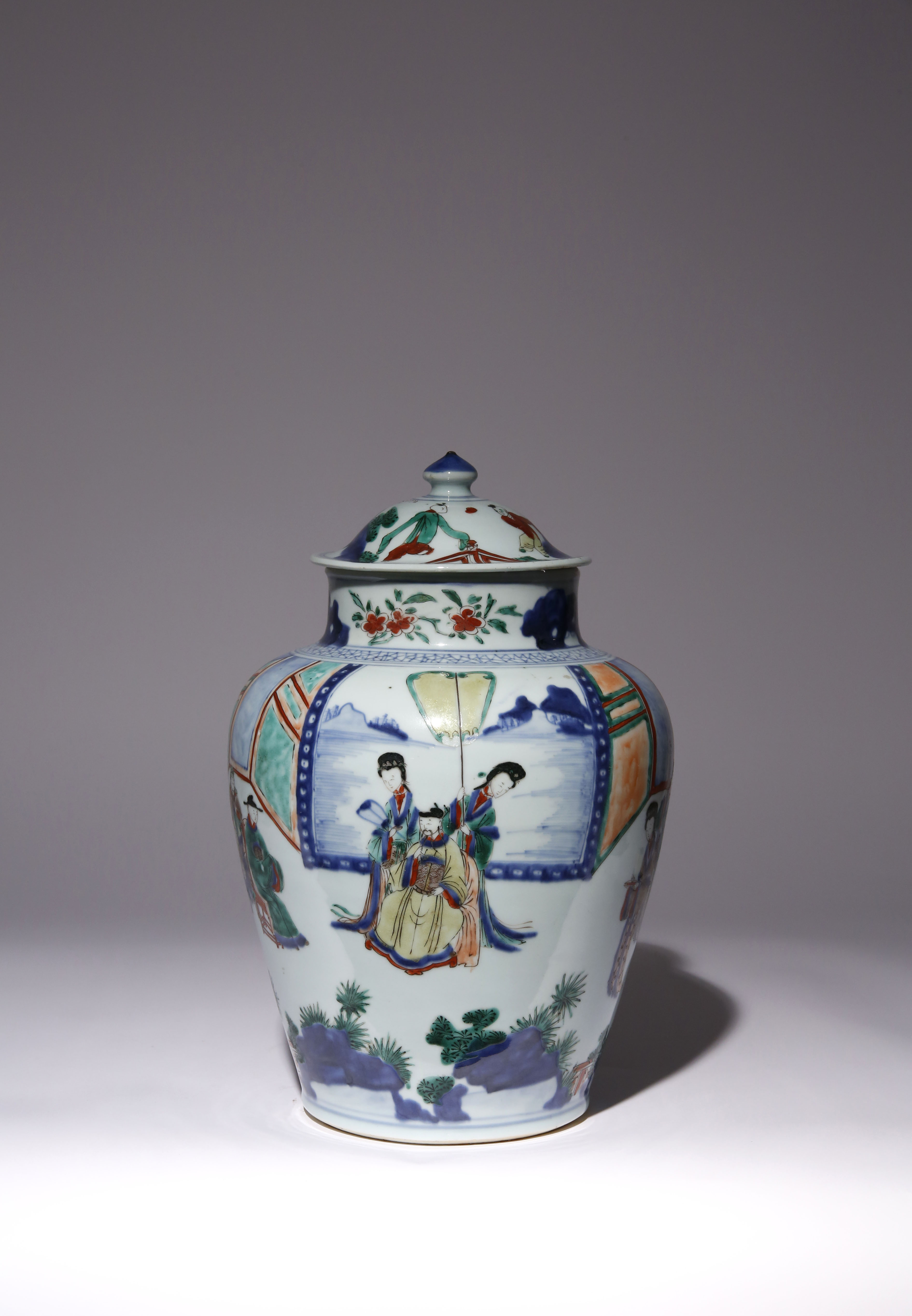 A CHINESE WUCAI 'FIGURAL' VASE AND COVER TRANSITIONAL C.1650 The ovoid body painted with a scene