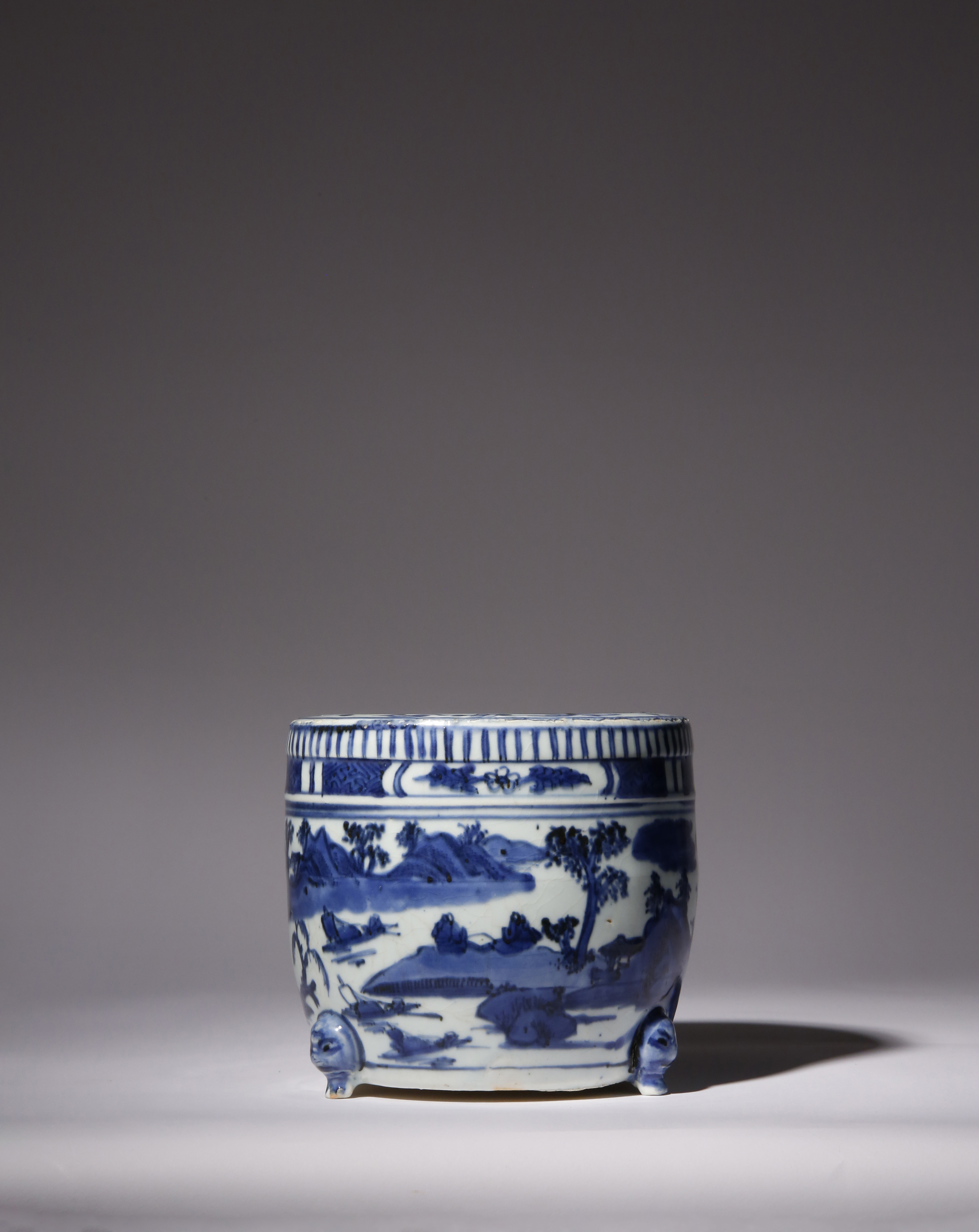 A CHINESE BLUE AND WHITE CIRCULAR INCENSE BURNER LATE MING DYNASTY The tapering cylindrical body