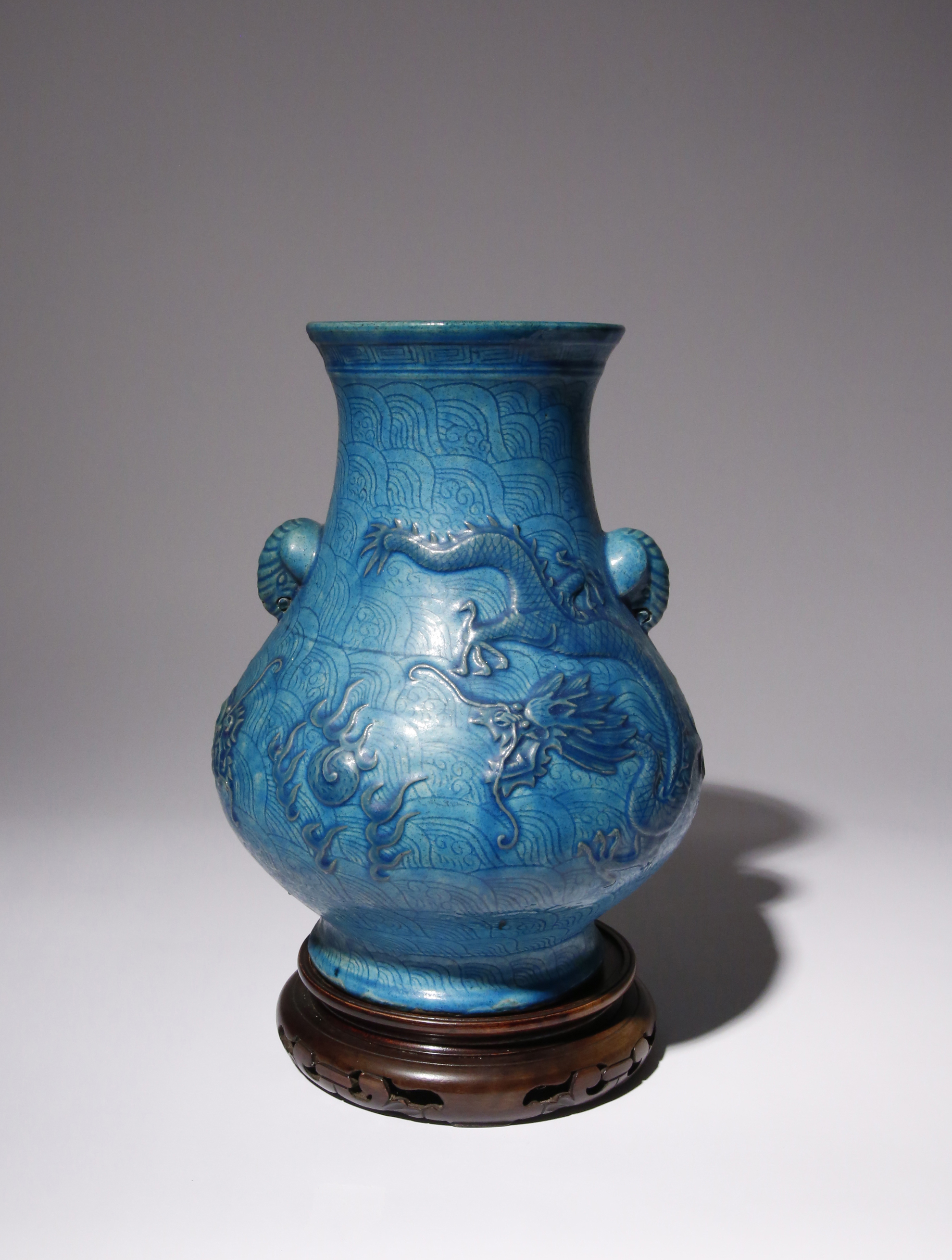 A CHINESE TURQUOISE GLAZED 'DRAGON' VASE 19TH CENTURY The globular body decorated with two dragons