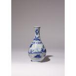 A CHINESE BLUE AND WHITE 'BOYS' BOTTLE VASE TRANSITIONAL C.1650 The body painted with three boys