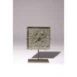 A CHINESE SILVERED BRONZE MIRROR PROBABLY TANG DYNASTY Decorated in relief with a medallion of