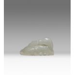 A CHINESE PALE CELADON JADE CARVING OF A LONG MA QING DYNASTY OR LATER The recumbent scaly horse